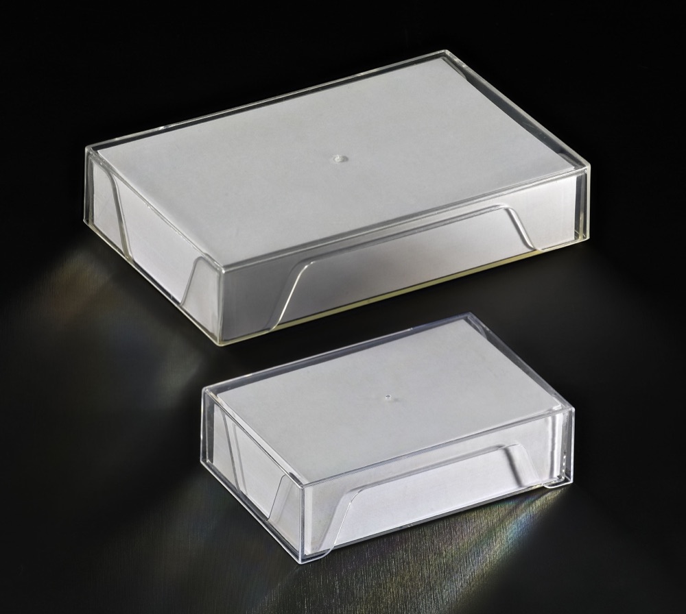 Two crystal boxes filled with business cards