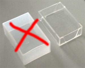 Comparison: a soft, warped box from the market and a Plastilys shockproof box